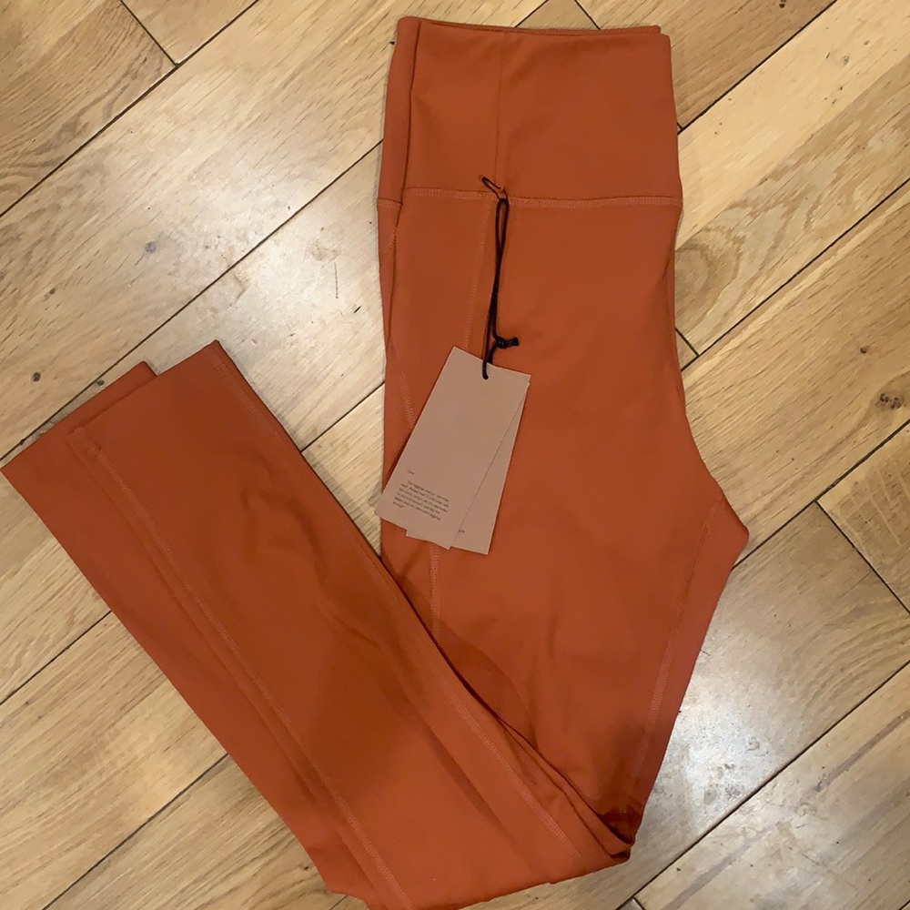 NWT Girlfriend Collective compressive high-rise legging. Orange. Size large.